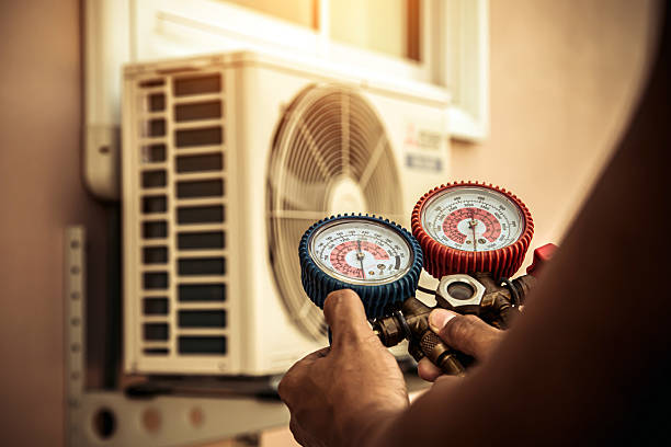 Professional Heat Pump Repair technician working in Eddyville, IA